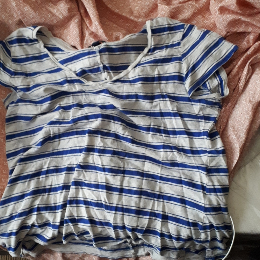 A gap shirt, that Is blue and white